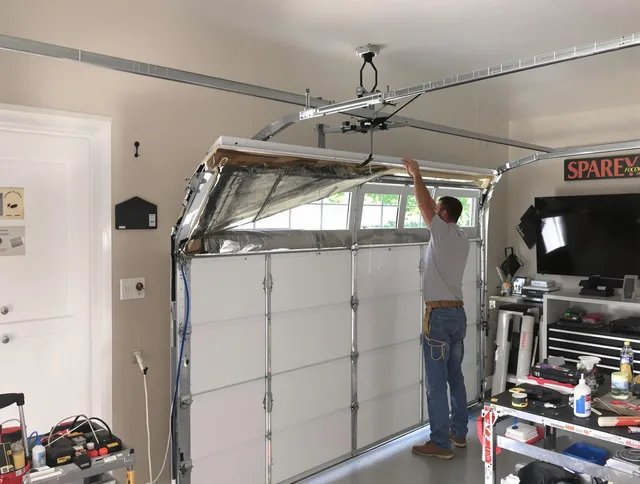 Garage door section replacement by East Windsor Garage Door Repair in East Windsor