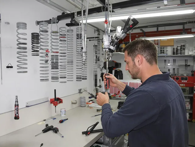 East Windsor Garage Door Repair safety certified technician performing precision spring replacement in East Windsor